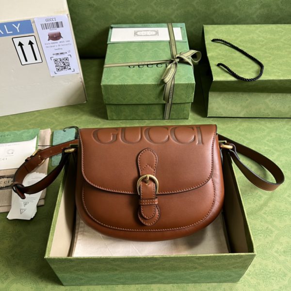 Gucci Logo Embossed Leather Shoulder Bag in Brown